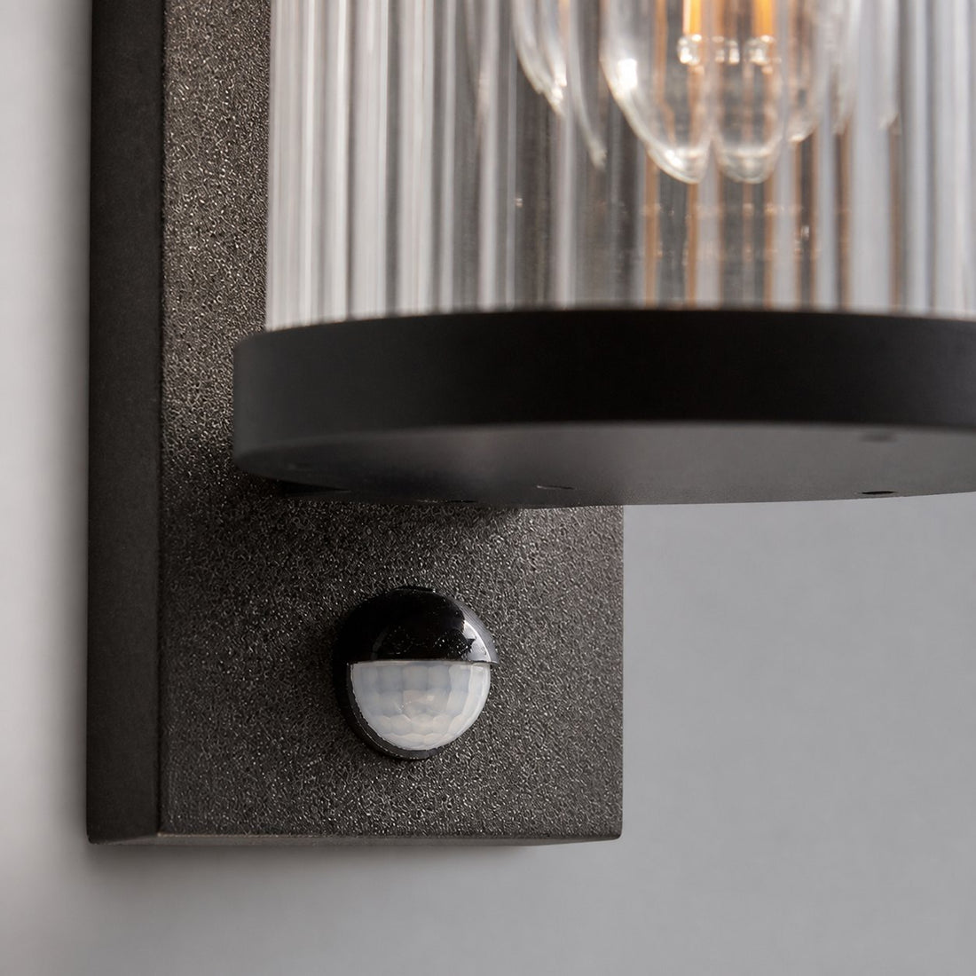 Karbonis Modern Outdoor Wall Sconce - Motion Sensor Security Light for Porch and Garden
