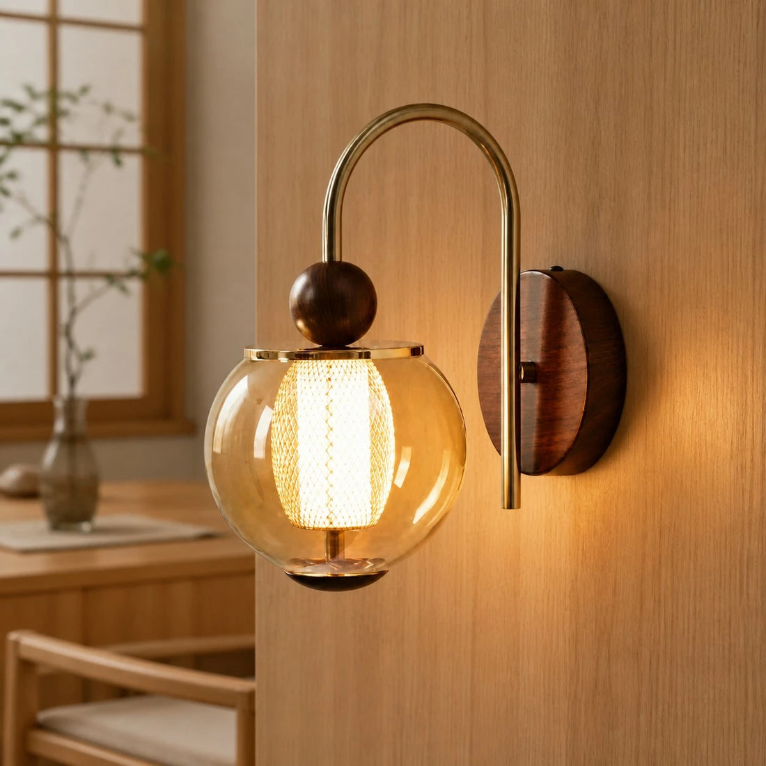 Arched amber-glass wall sconce in a wood dining setting