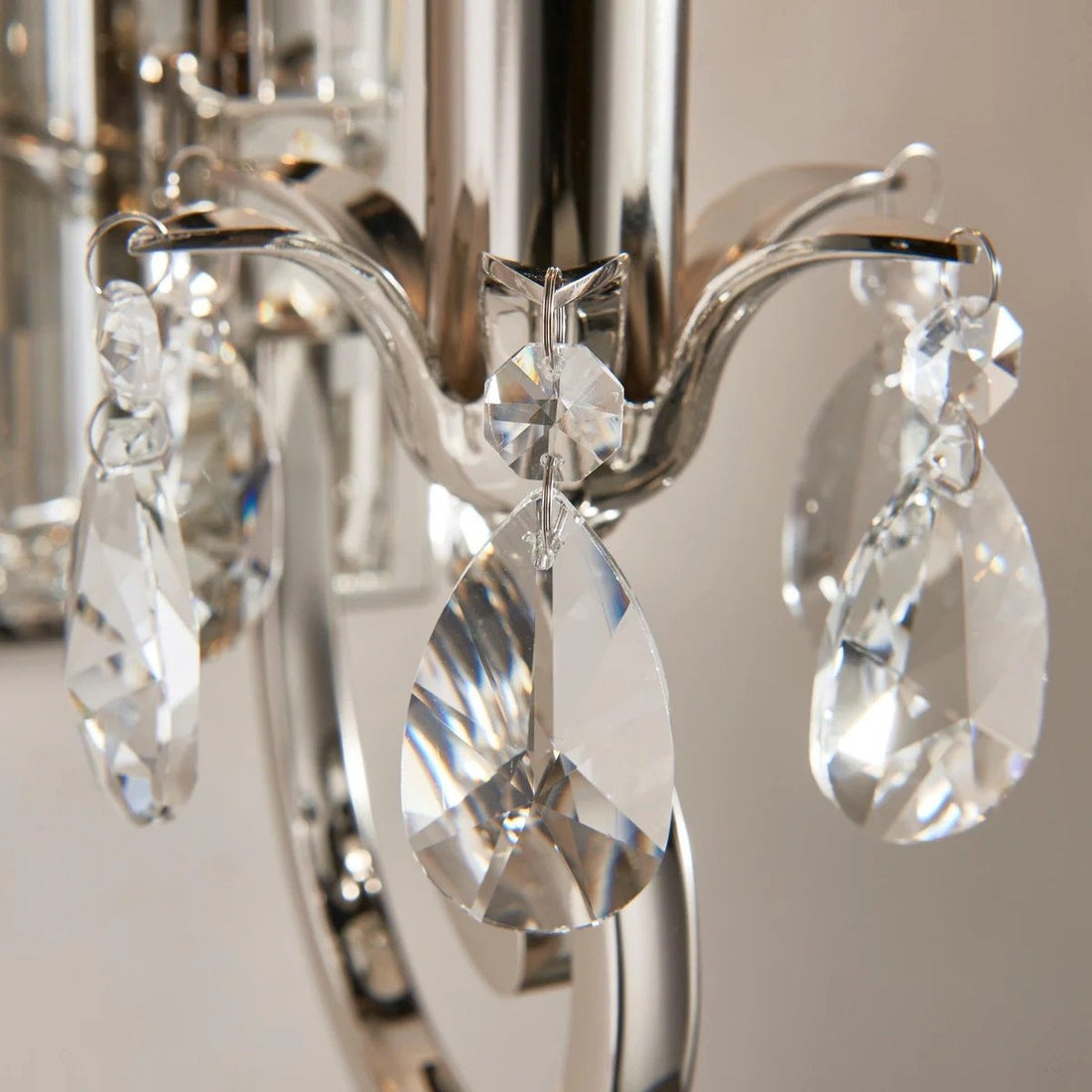 Talonis Crystal Accent Wall Light – Curved Chrome Arm Design for Living and Hallway Spaces