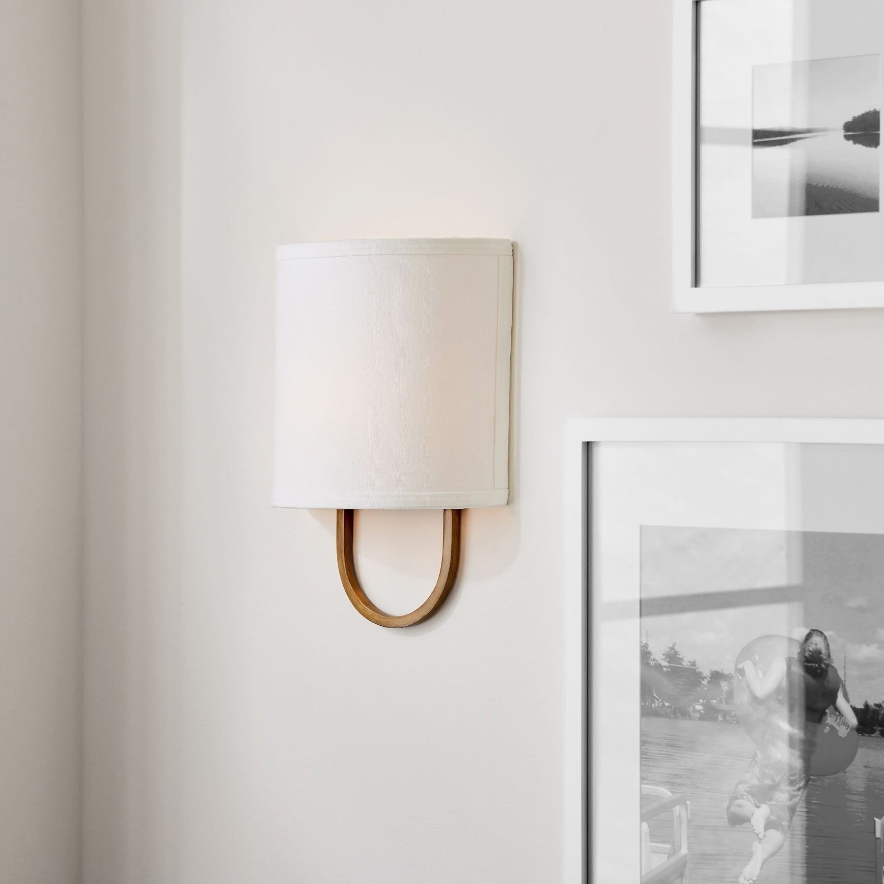 Nolvara Elegant Wall Light Featuring Soft Shade and Metal Arm