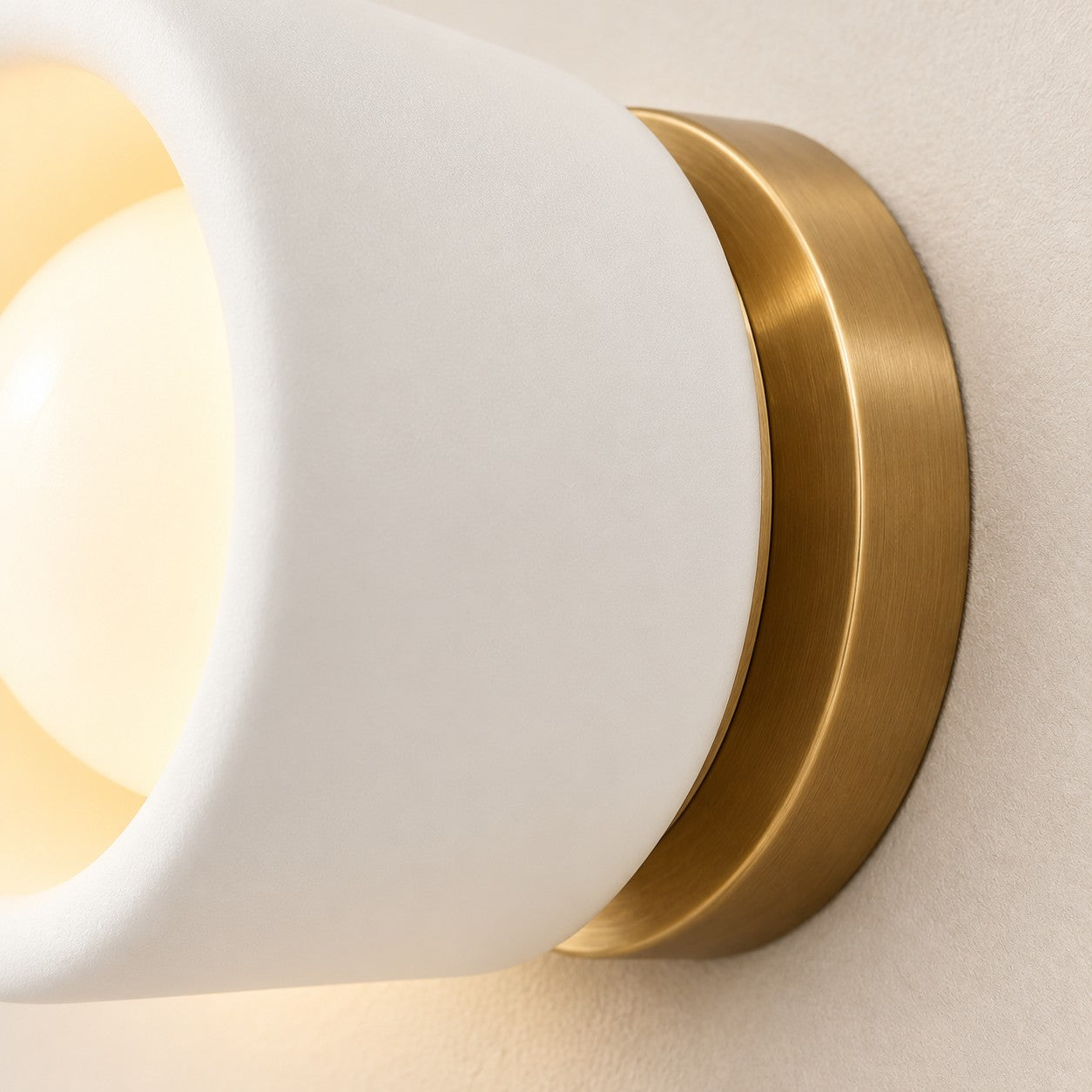 Close-up of the illuminated globe inside the porcelain shade