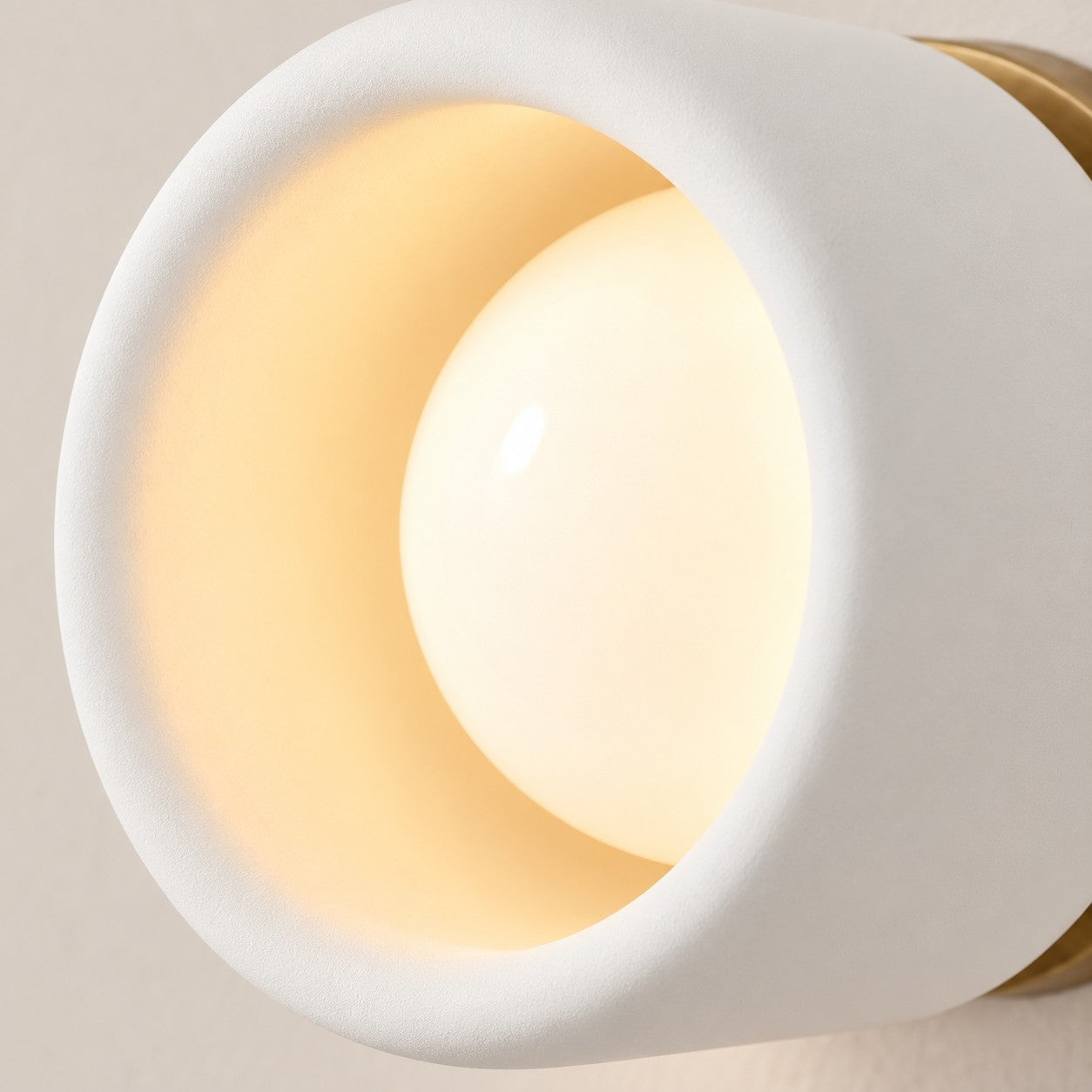 Cerova style A white sconce mounted on a plain wall