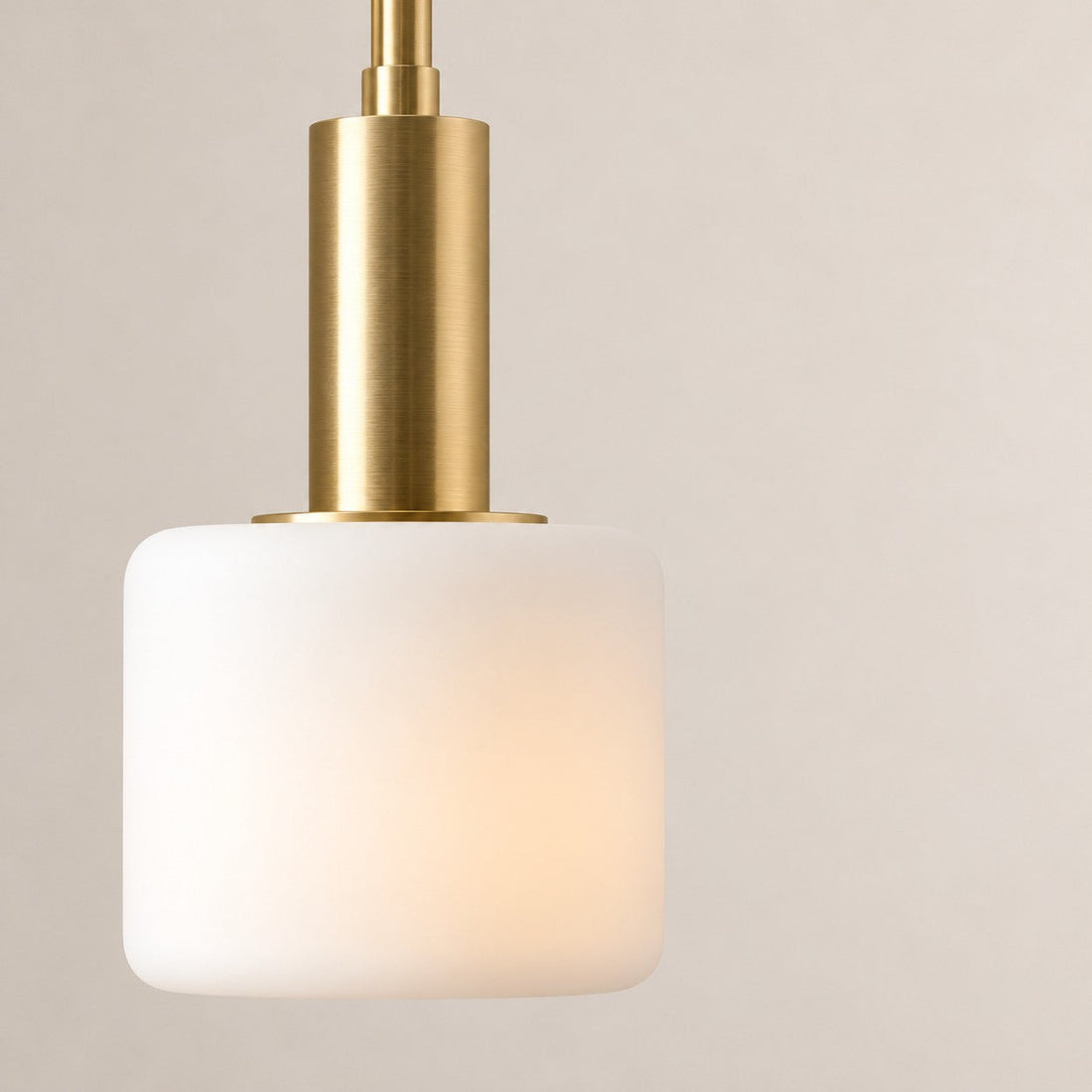 Illuminated white porcelain shade and brass hardware