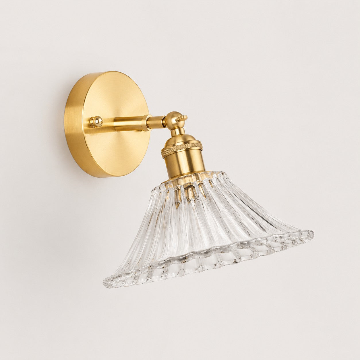 High clear shallow glass wall light with brass arm, IZ shade 6 cm high and 18 cm diameter