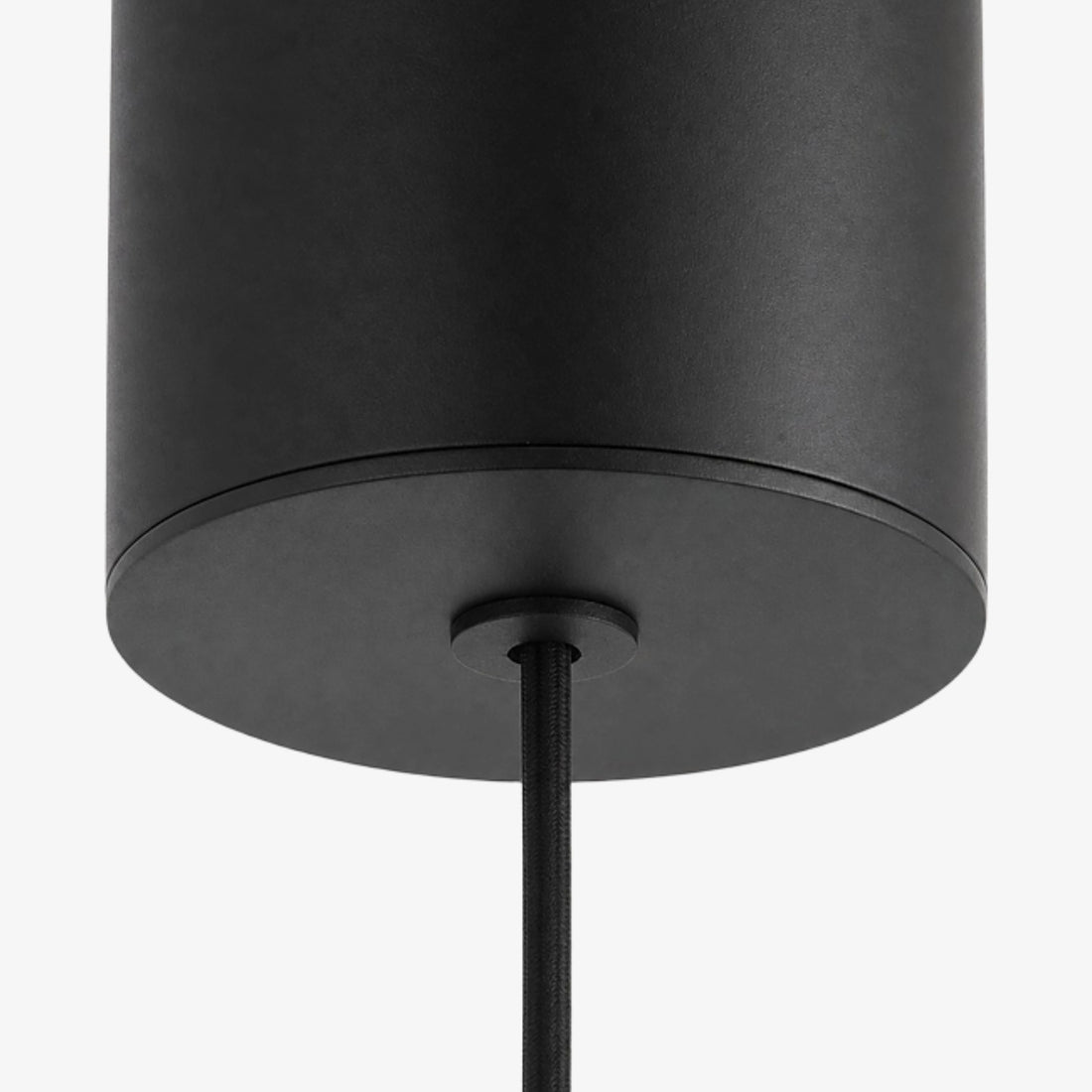 Black cylindrical ceiling canopy and braided suspension cable