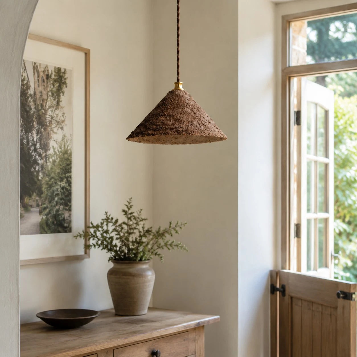 Textured cone pendant light in room setting