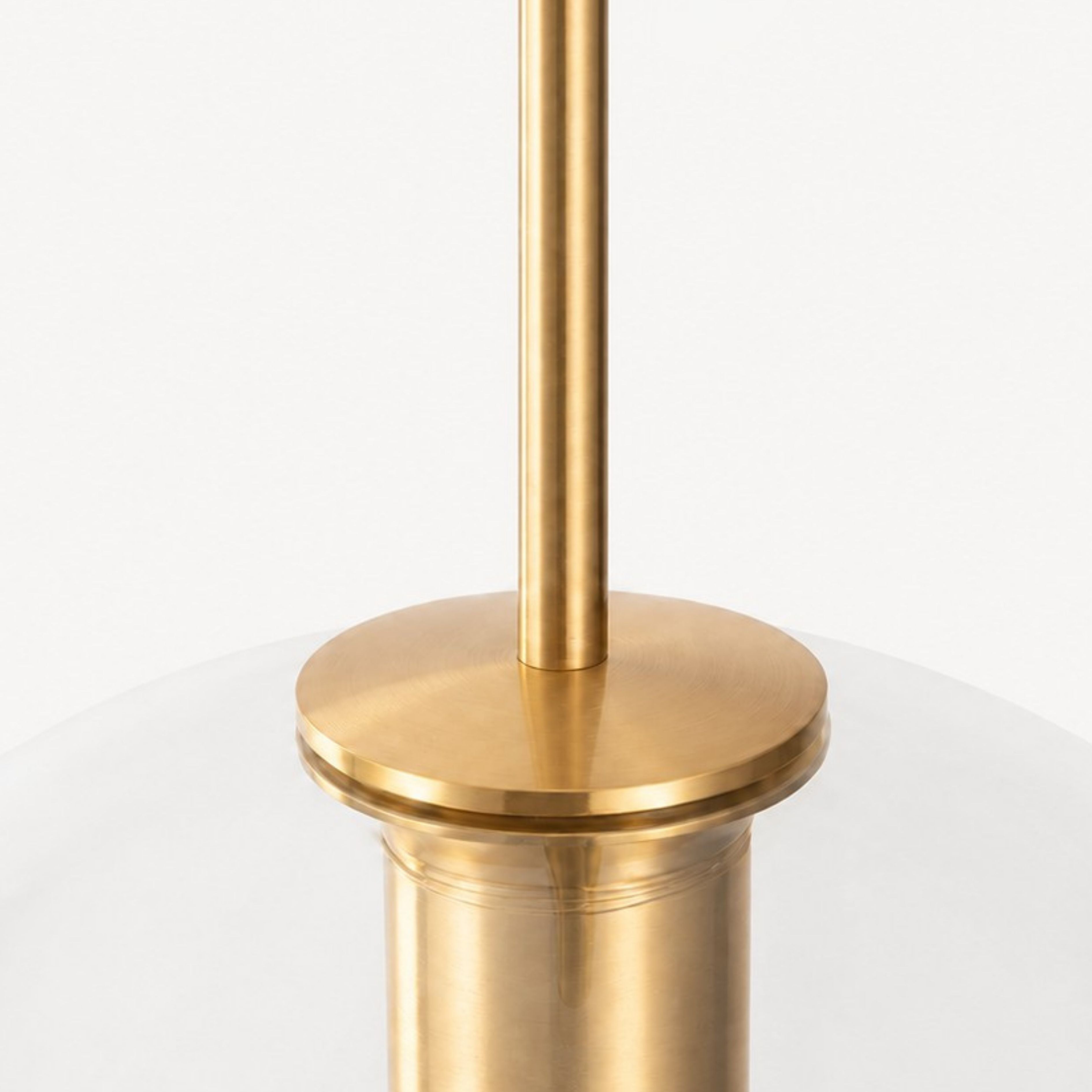 Slim pendant stem and fitted metal cap detail