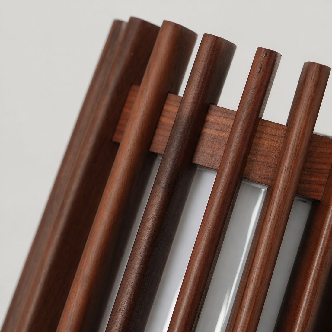 Boskelux Walnut Wall Lamp – Curved Backplate and Diffused Glow for Living Rooms or Hallways