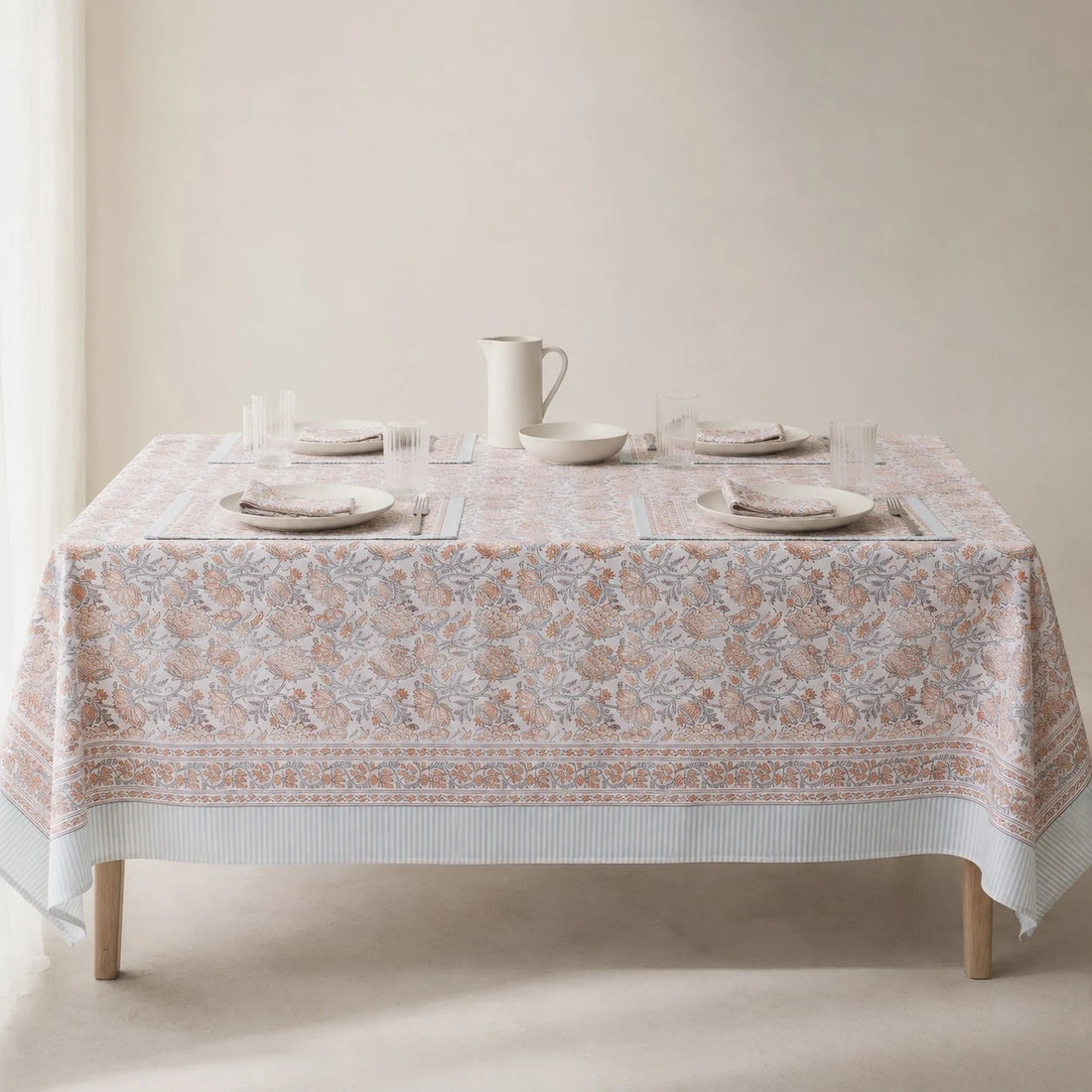 Mist blue floral tablecloth on a dining table