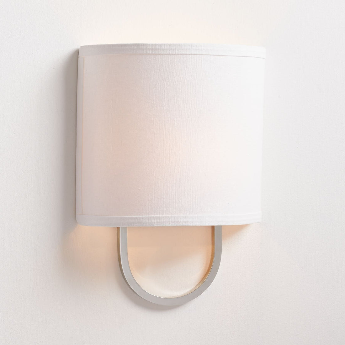 Nolvara Elegant Wall Light Featuring Soft Shade and Metal Arm