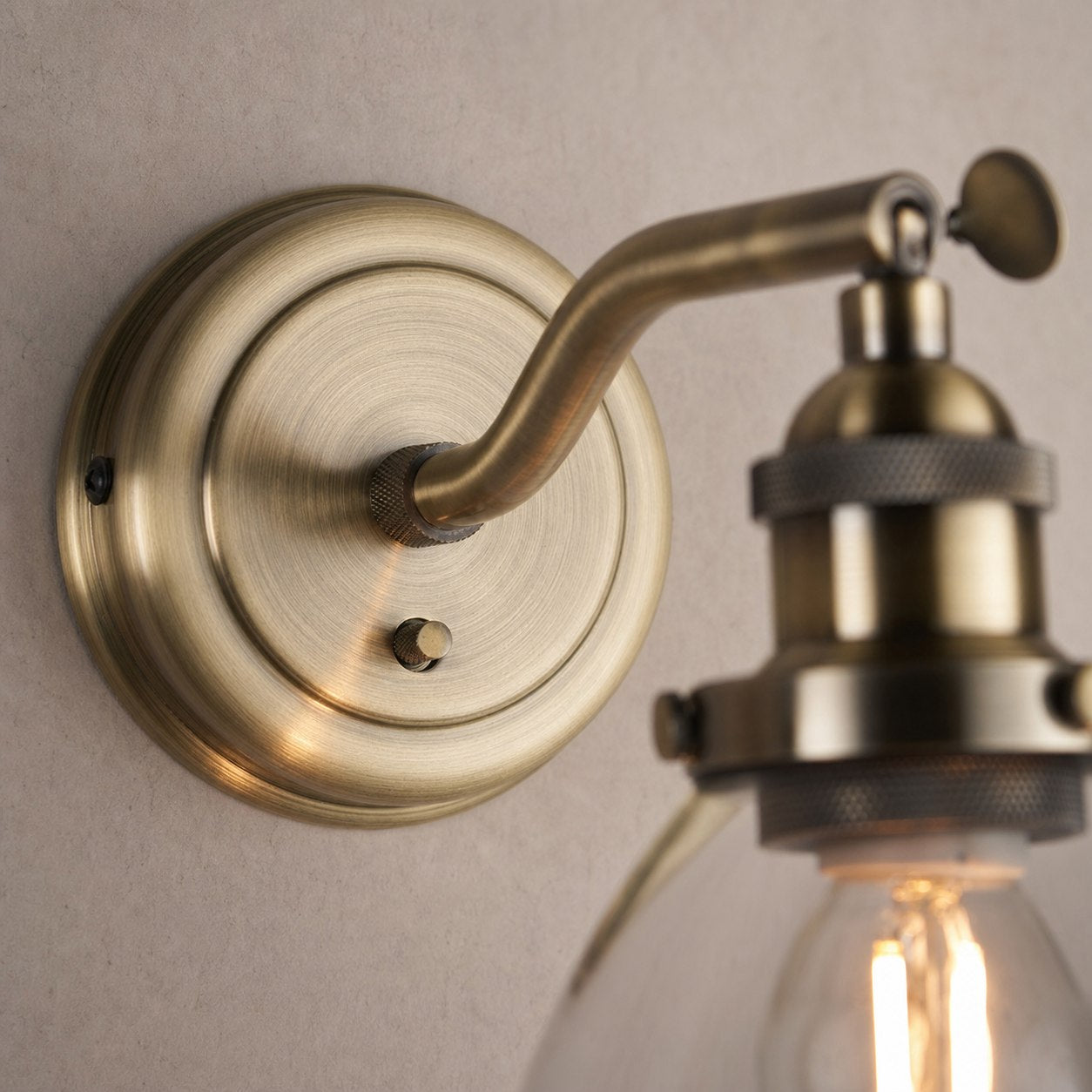 Adjustable Hansen Brass Wall Sconce - Clear Glass Design