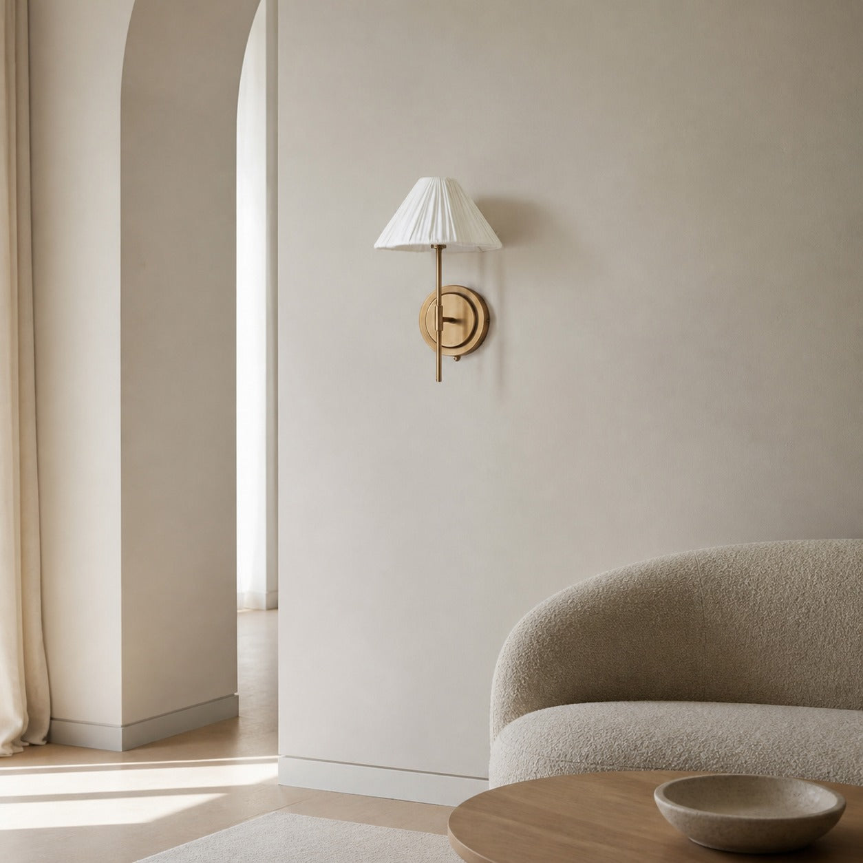 Lindi - aged brass and linen scalloped wall light