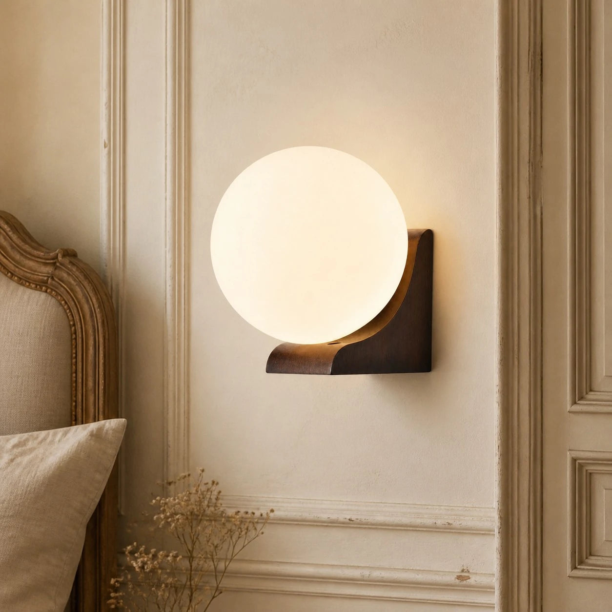 One-head Walnut globe wall sconce in a classic bedroom