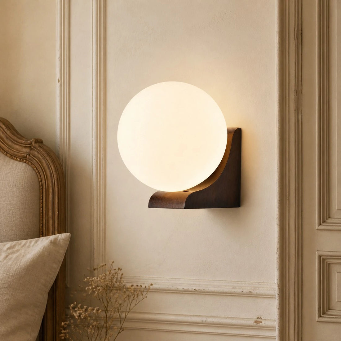 One-head Walnut globe wall sconce in a classic bedroom