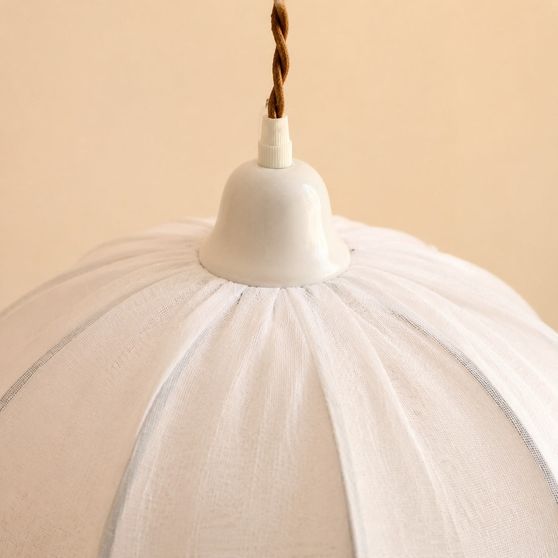 Pleated fabric shade and upper fitting detail
