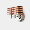 Front view of Bauhaus amber LED wall sconce with layered acrylic shade