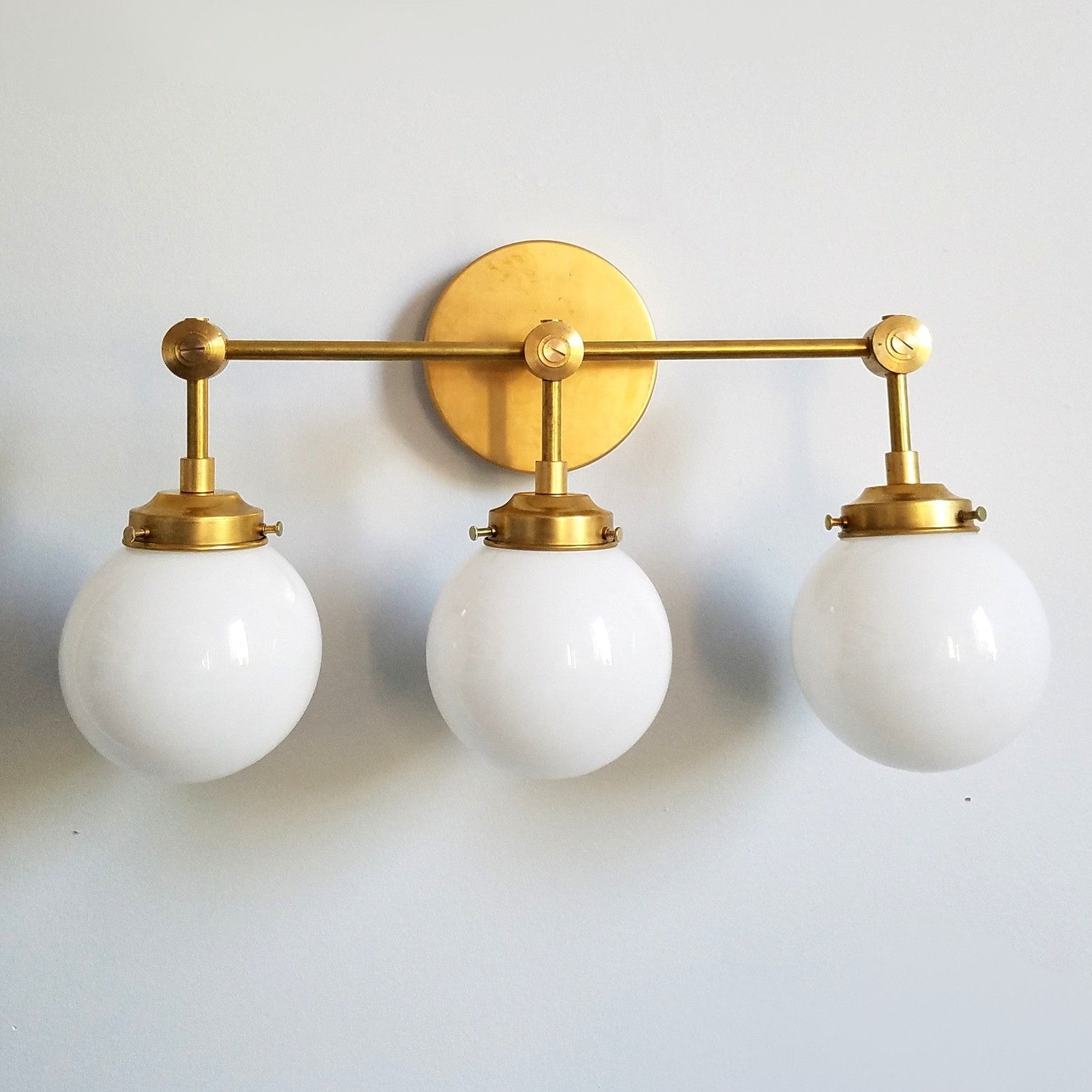 Three-Light Wall Sconce - Modern Brass & Glass Lighting for Home