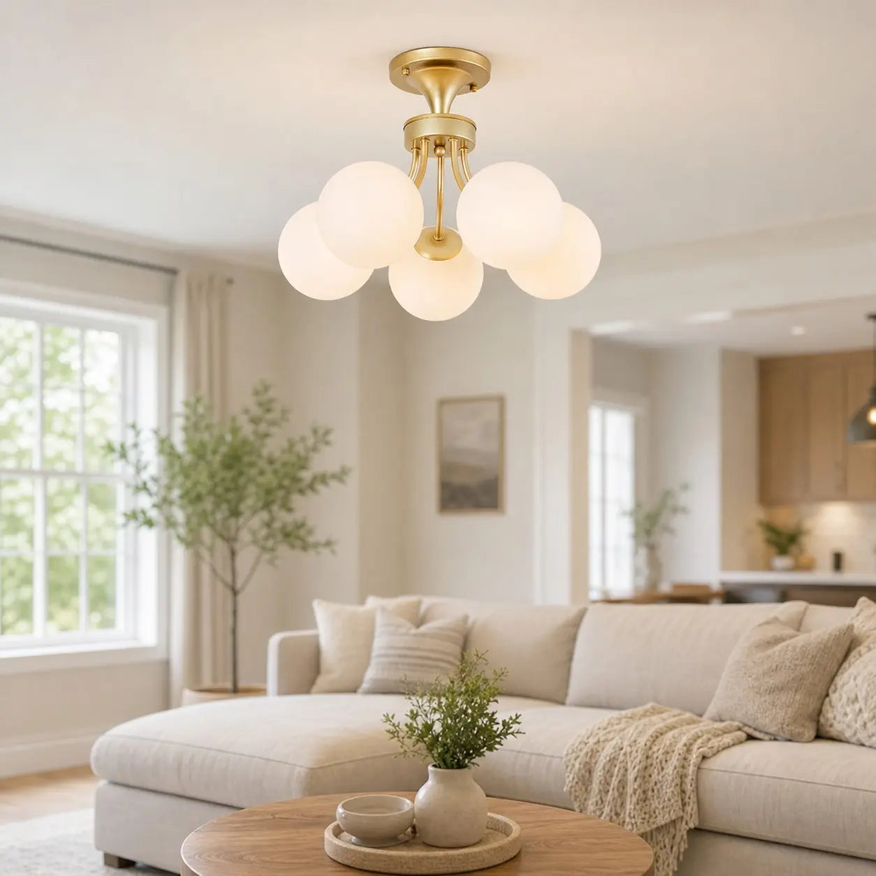 Gold globe ceiling light in a bright living room