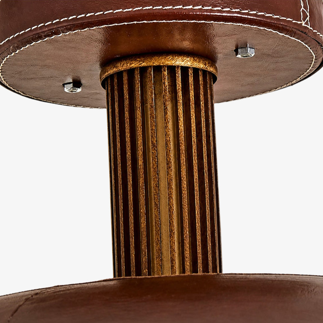 Antique brass ribbed column and stitched leather canopy detail
