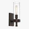 Seeded clear glass cylinder wall sconce with black finish