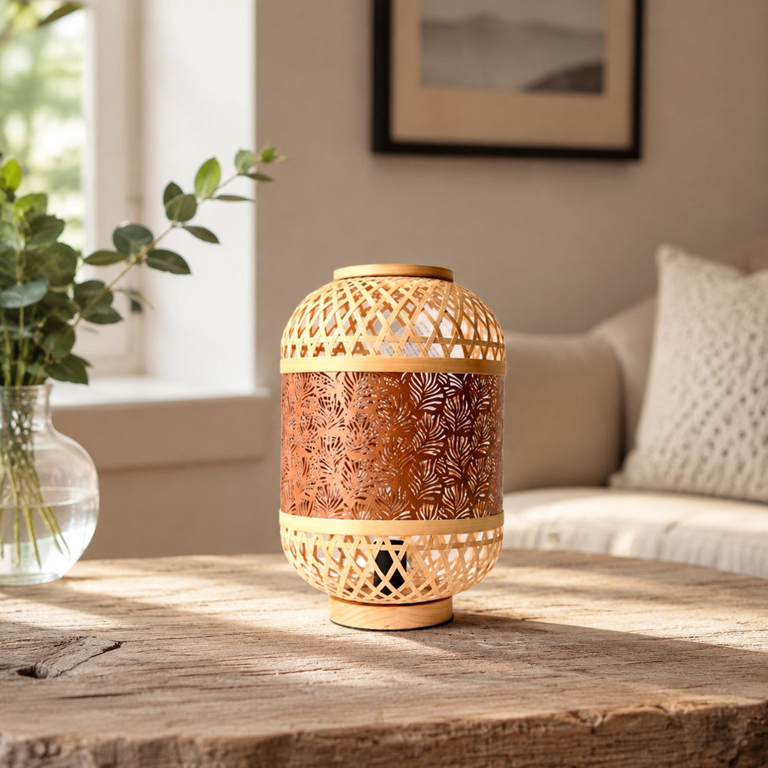 orange woven LED table lamp styled beside a sofa