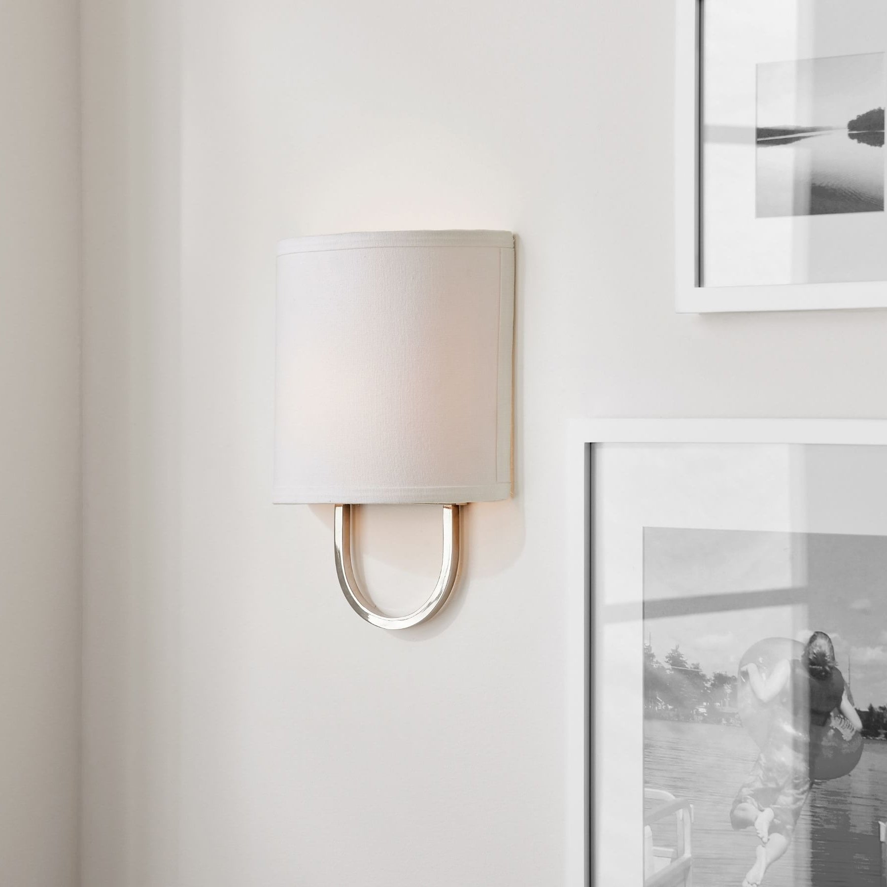 Nolvara Elegant Wall Light Featuring Soft Shade and Metal Arm
