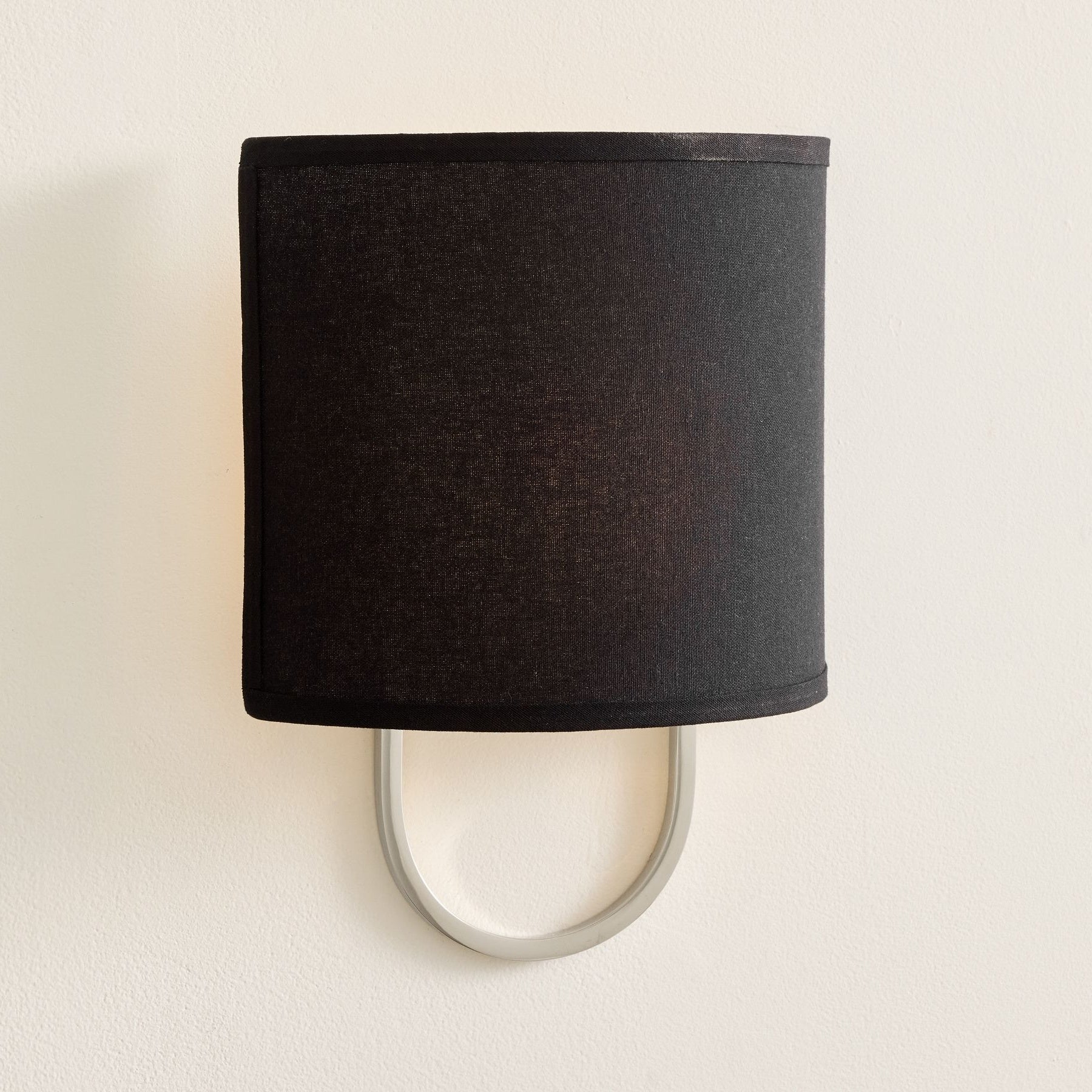 Nolvara Elegant Wall Light Featuring Soft Shade and Metal Arm