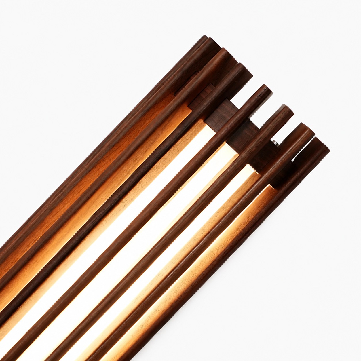 Boskelux Walnut Wall Lamp – Curved Backplate and Diffused Glow for Living Rooms or Hallways