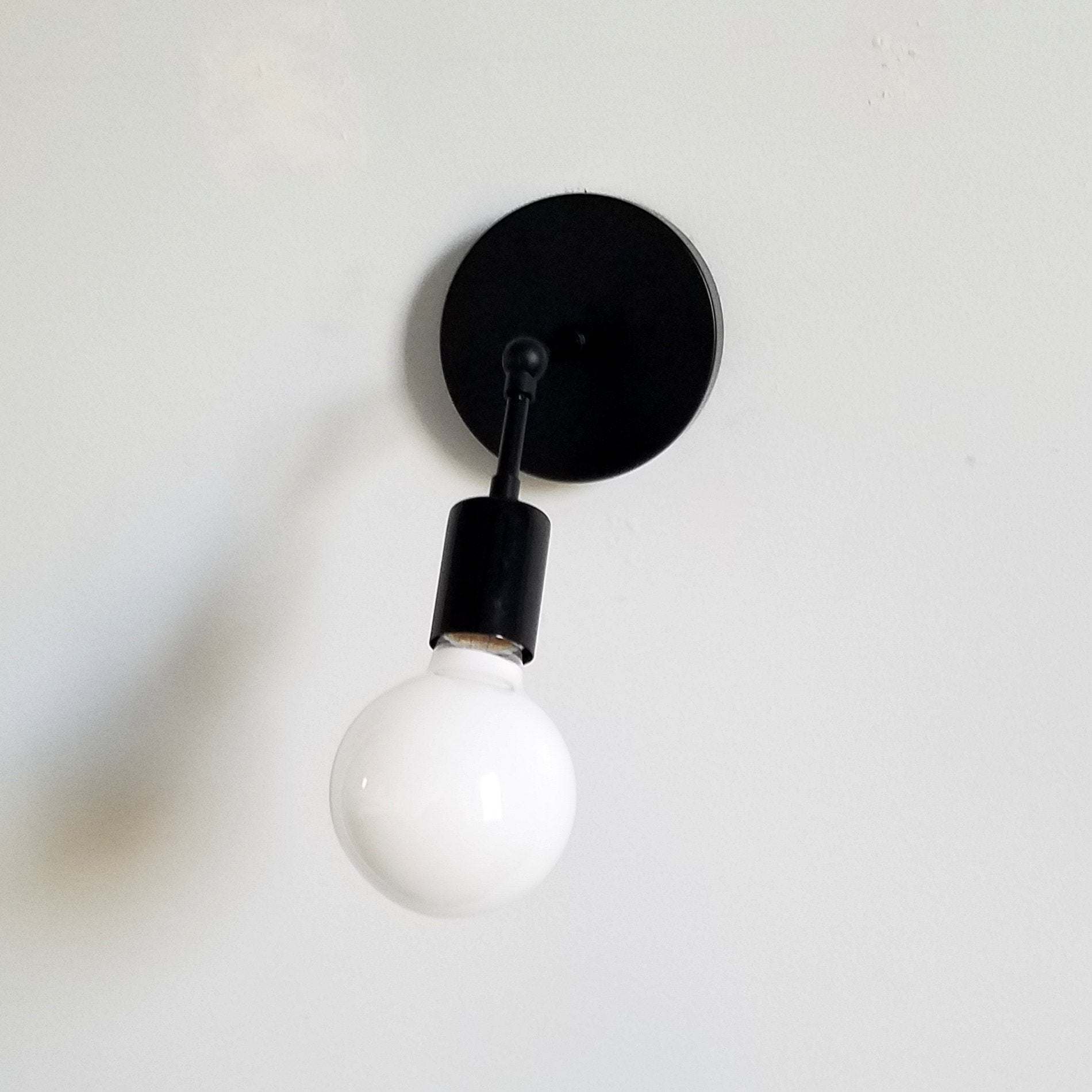 Black Swivel Functional Wall Sconce - Stylish Bedroom & Bathroom Accent