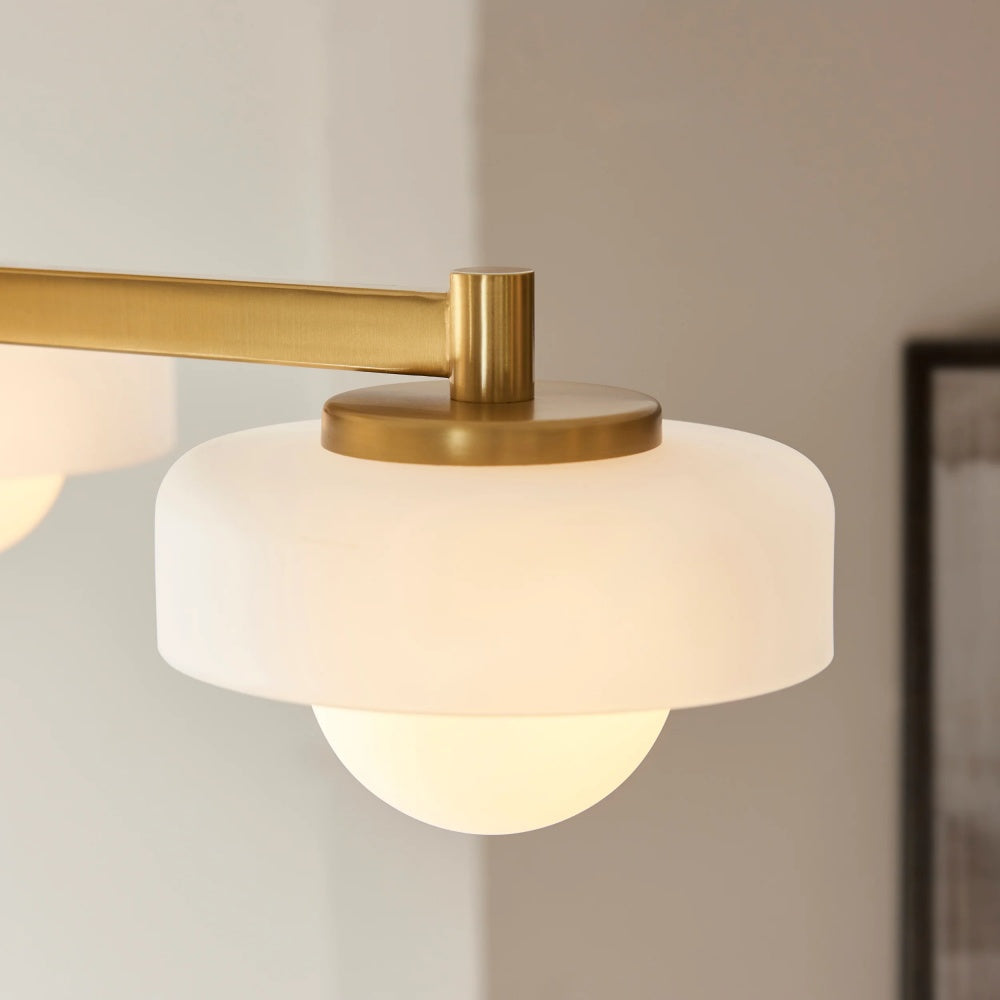 Zirvos Pendant with Frosted Opal Globes and Brushed Brass Frame for Living and Dining