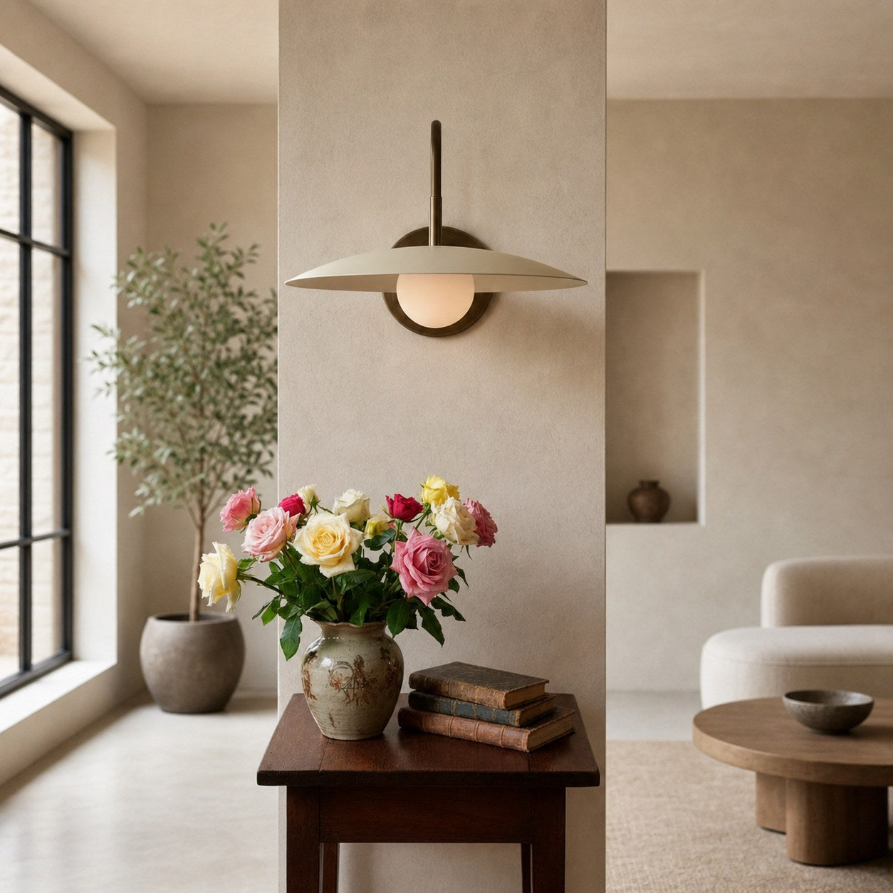 Curva Metal Modern Wall Sconce - Antique Brass Arm with Cream Disc Shade