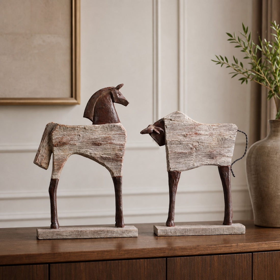 Equora horse and bull sculptures styled with neutral decor