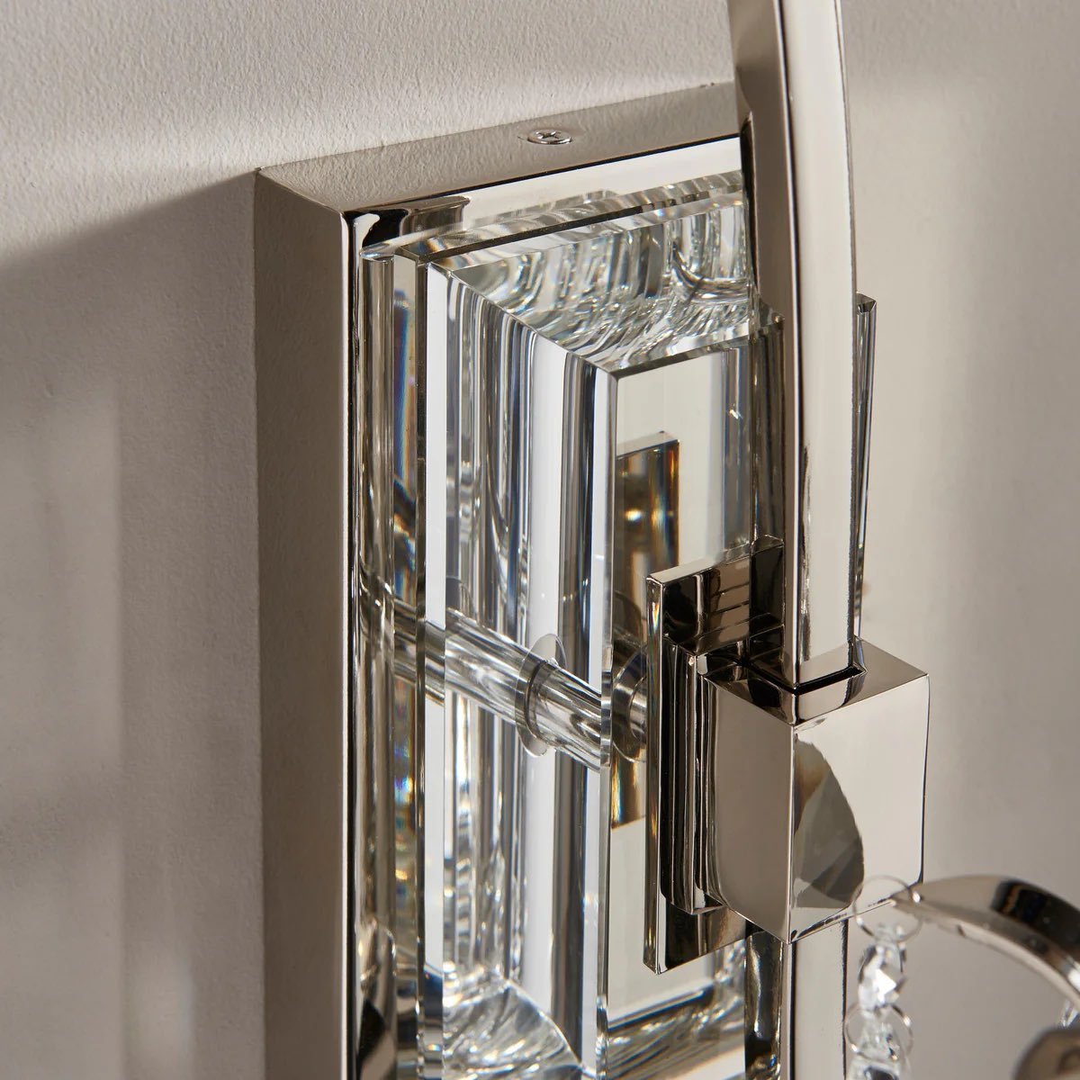 Talonis Crystal Accent Wall Light – Curved Chrome Arm Design for Living and Hallway Spaces