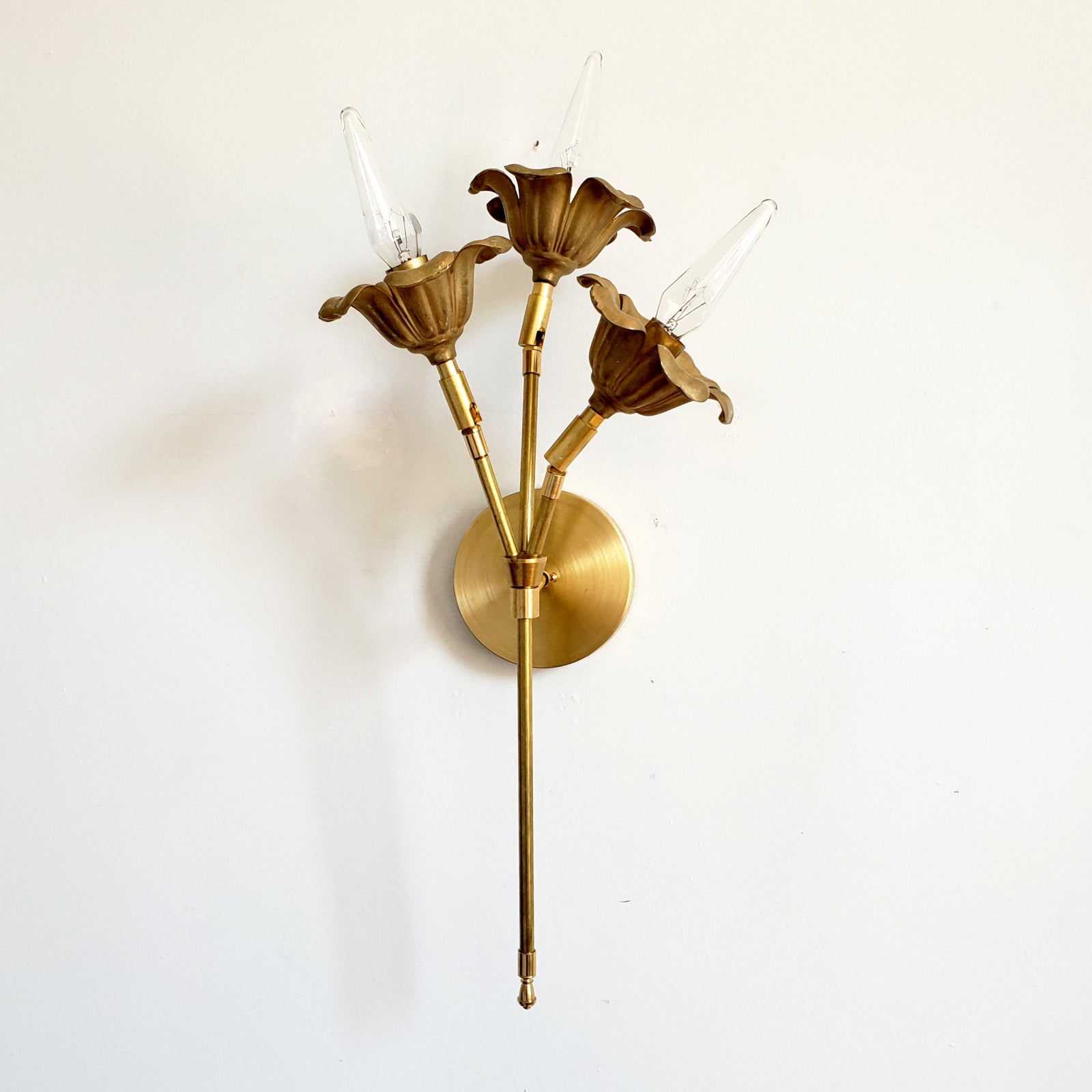 Three-Light Brass Wall Sconce - Floral Design for Elegant Interiors
