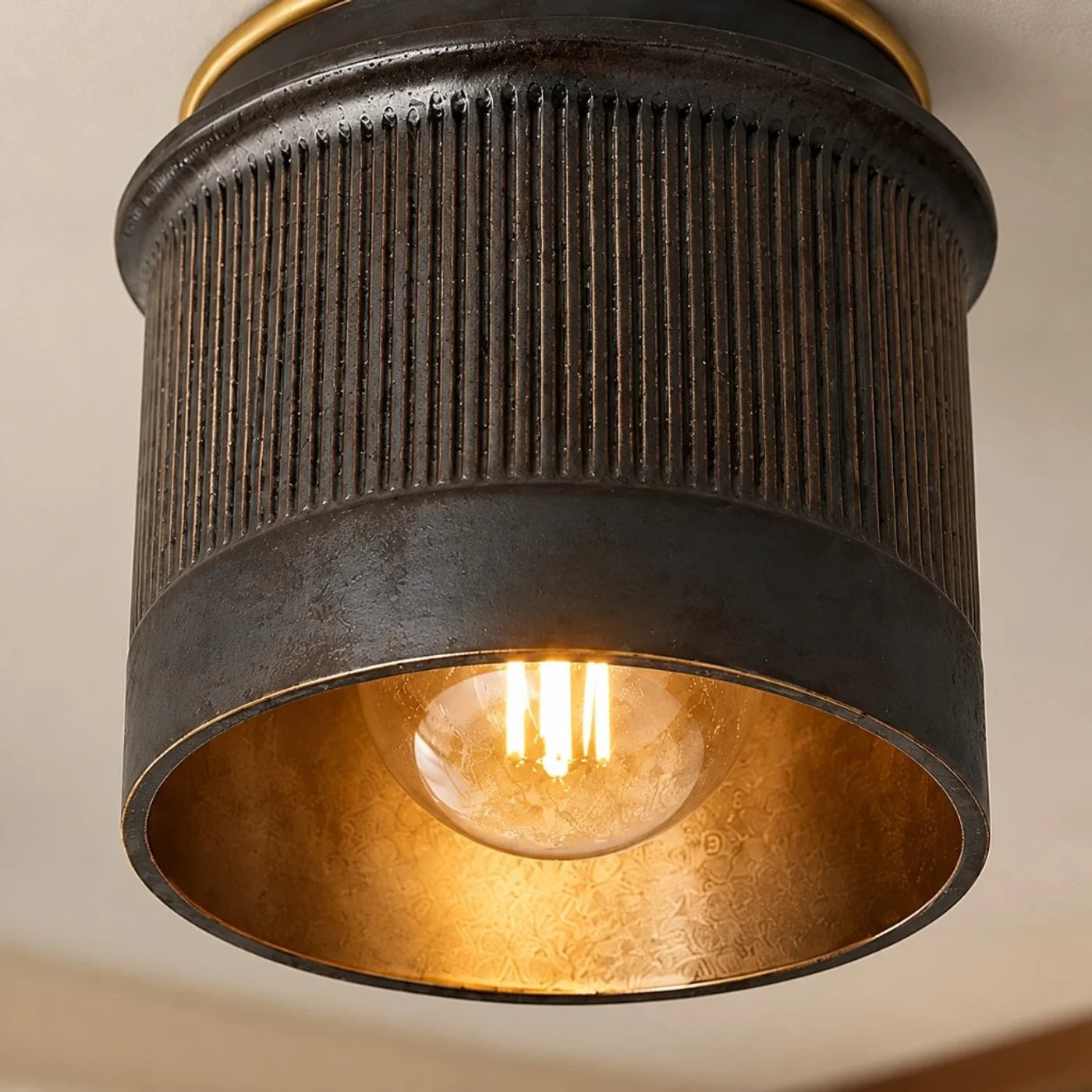 Ferrona black industrial flush mount installed on a ceiling
