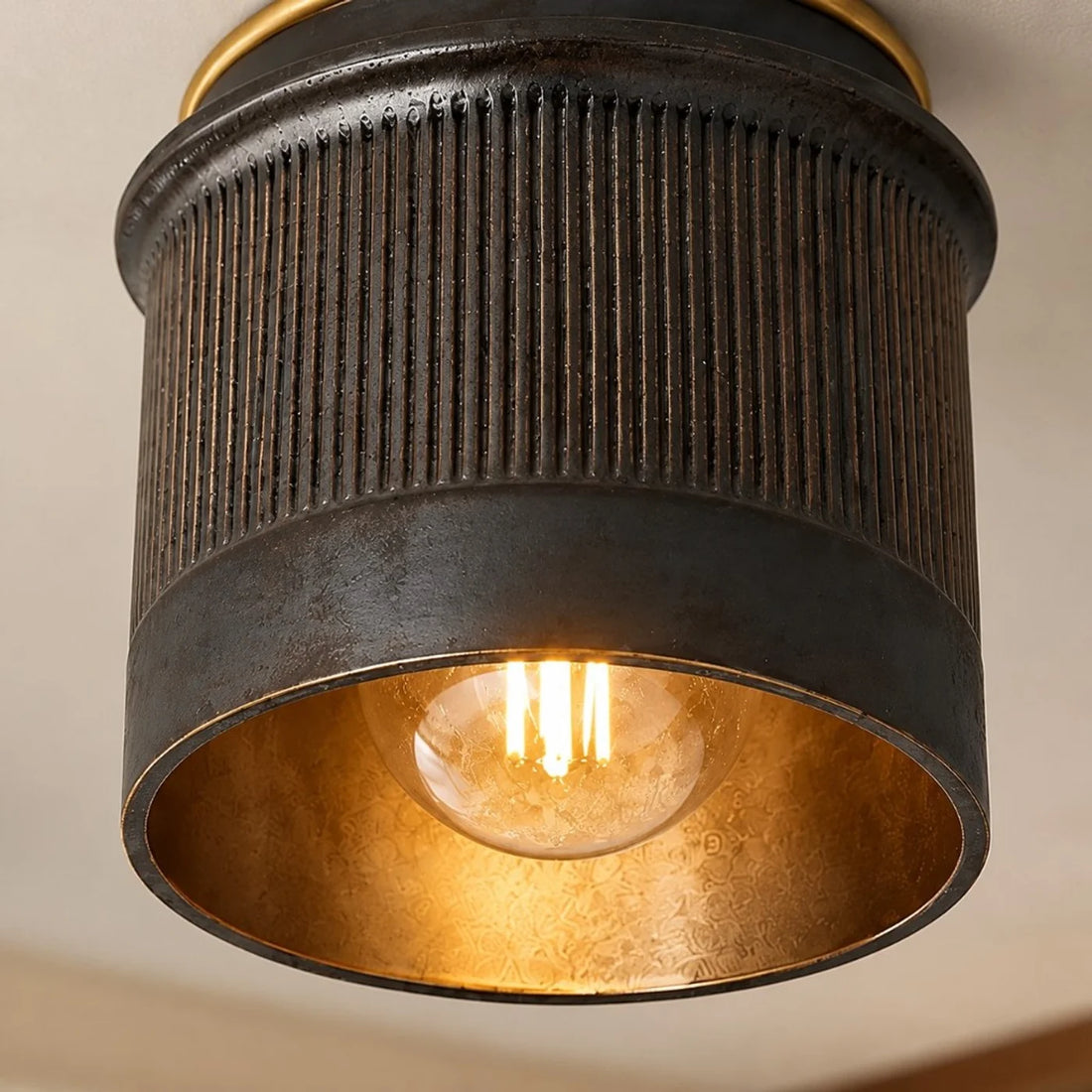 Ferrona black industrial flush mount installed on a ceiling