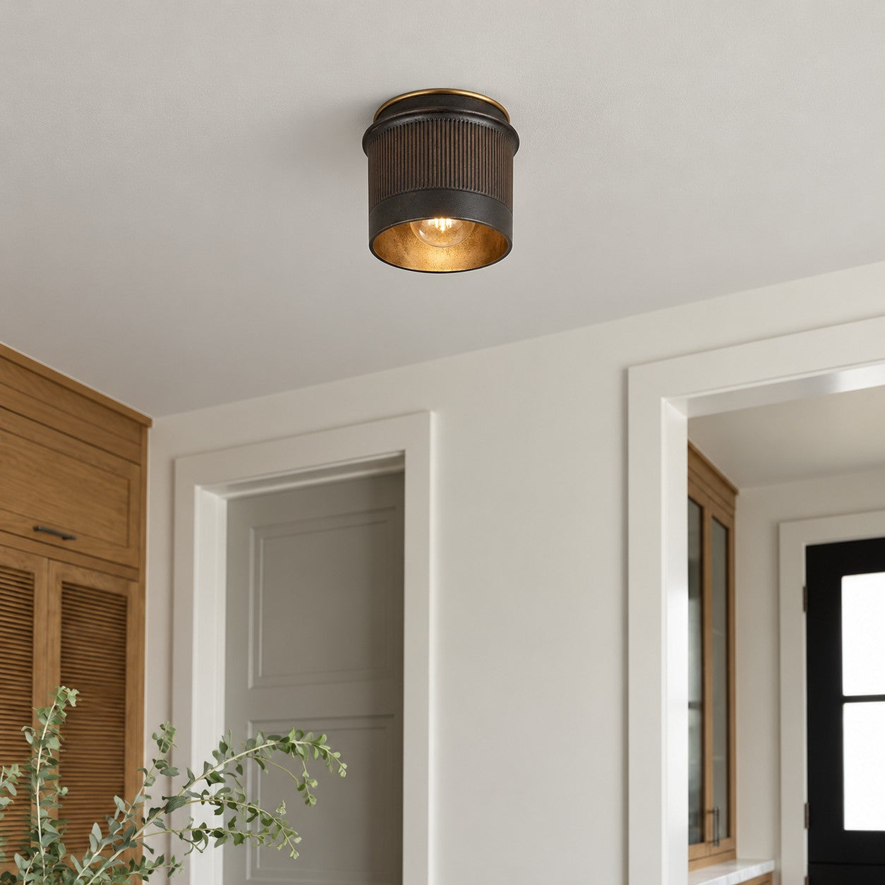 Ferrona black industrial flush mounts styled in an entry hall