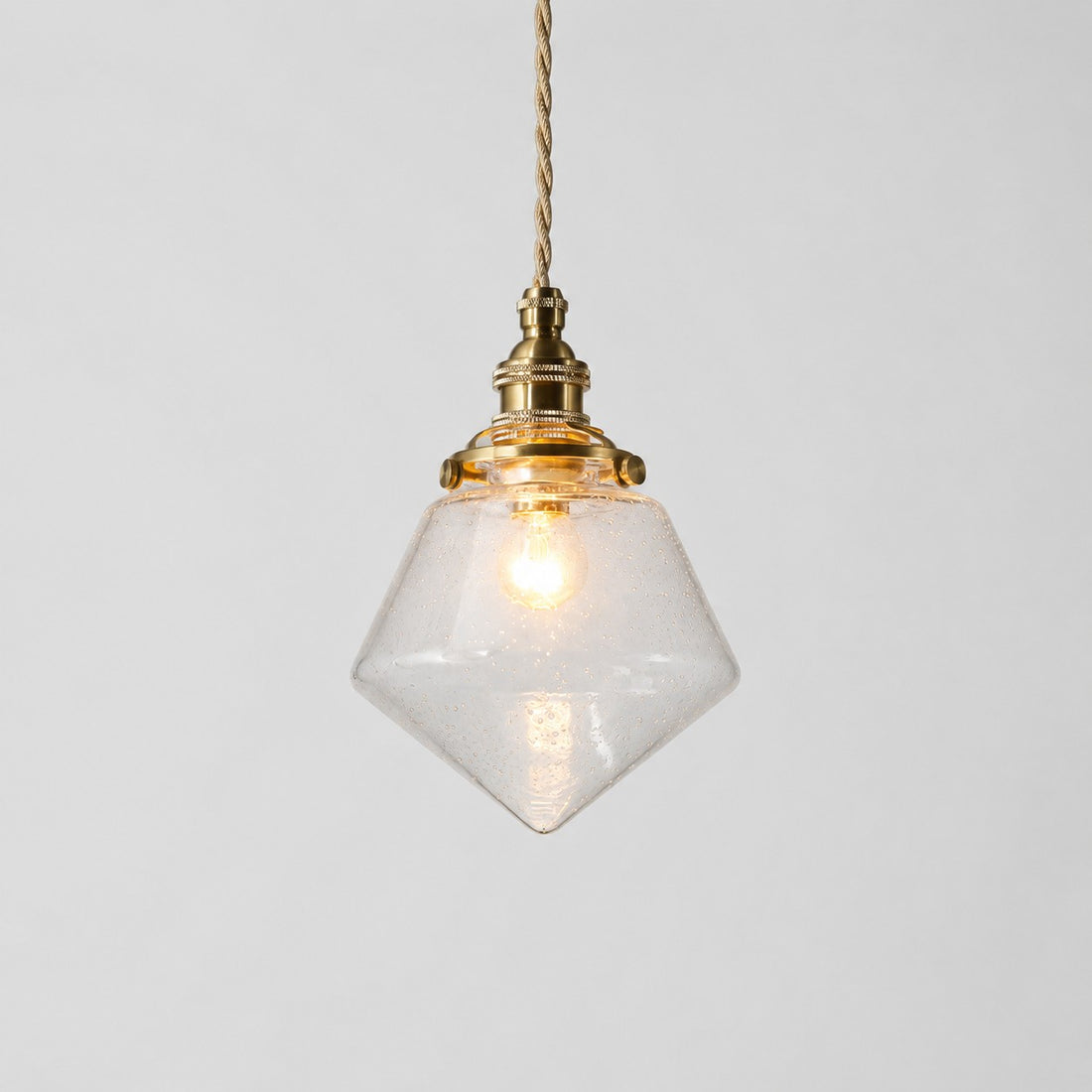 Bubble glass pendant with clear shade and warm canopy