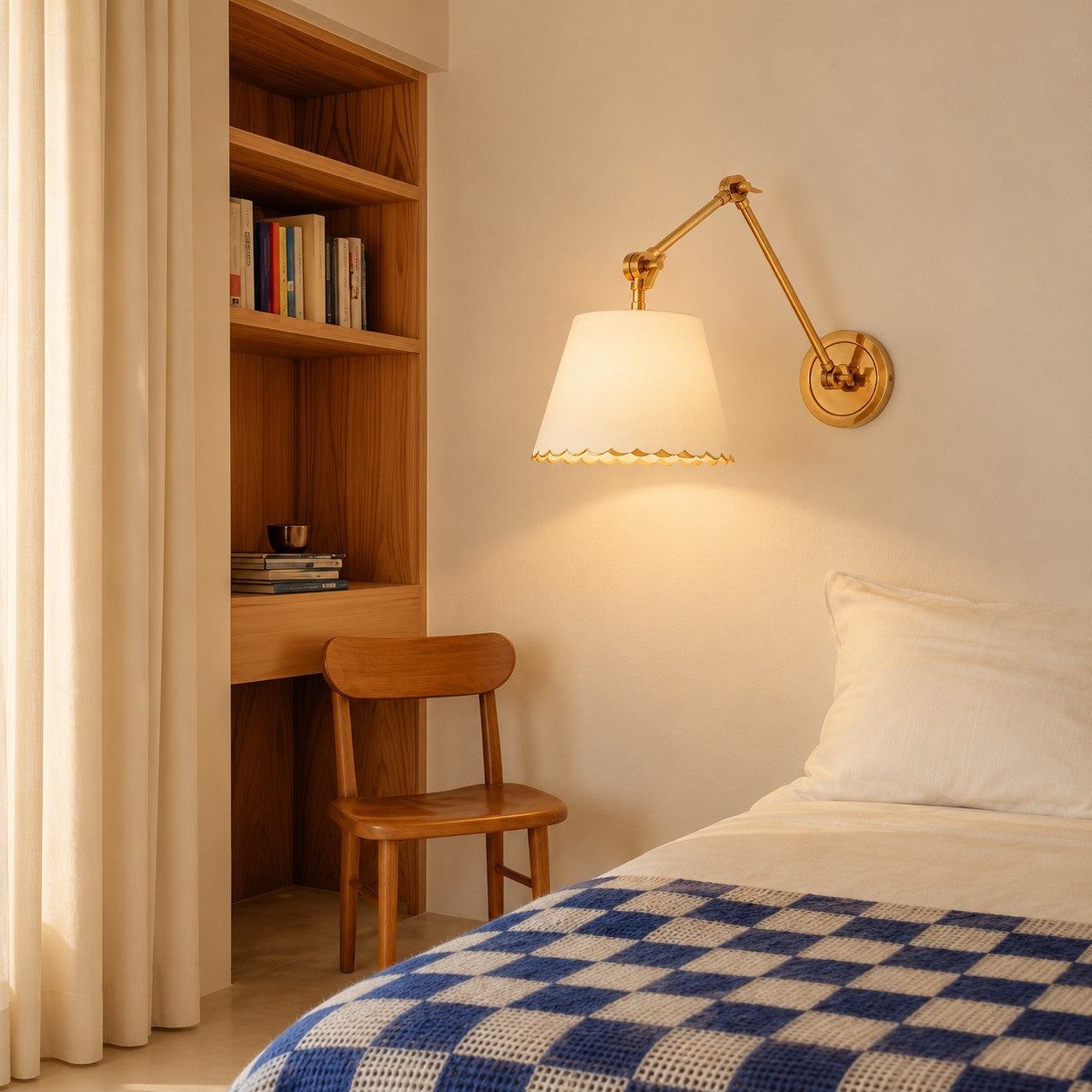 White Foldray sconce styled beside a built-in desk