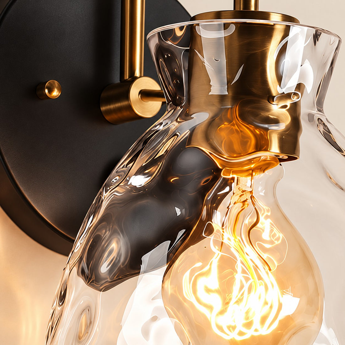 Gildon ripple glass wall sconce brass fitter and black backplate close-up