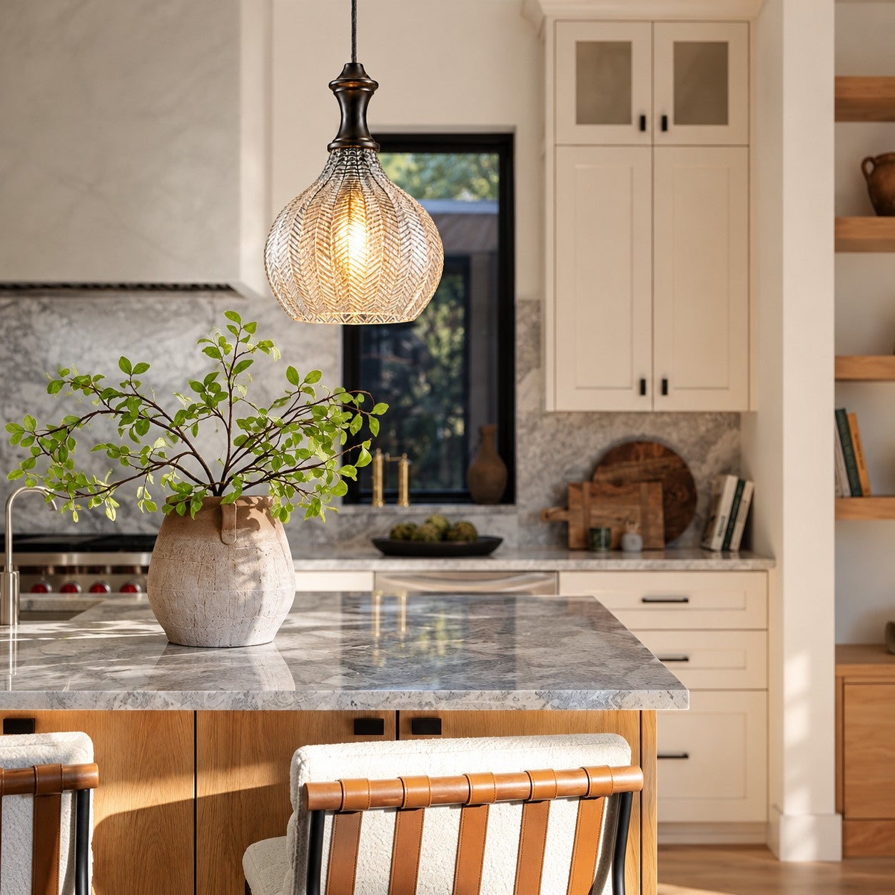 Gildon tall glass pendants styled over a dining table