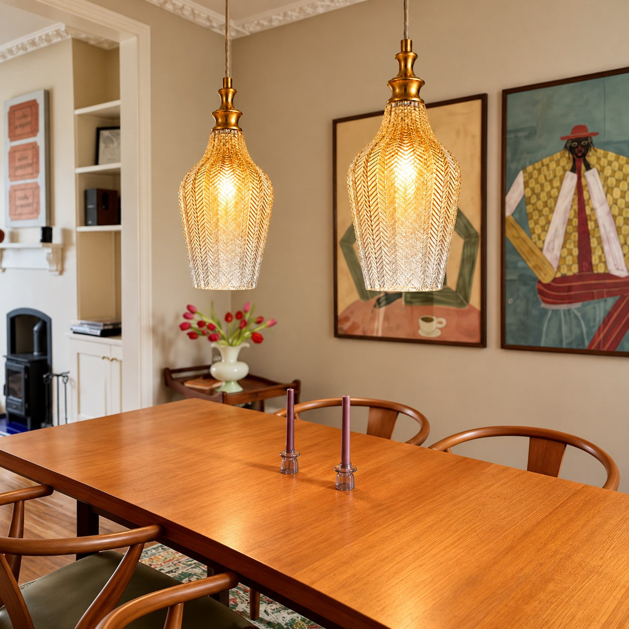 Gildon tall glass pendants styled above a dining table
