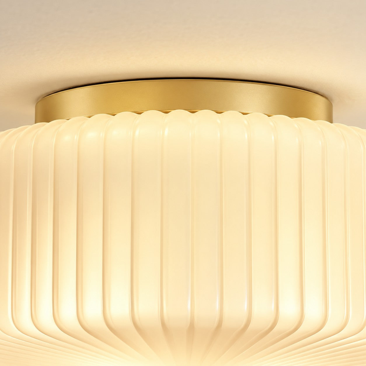 Close-up of the brass ring and vertical ribs on the opaline shade