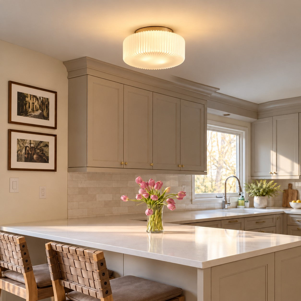 Ceiling lamp styled in a kitchen with pink tulips