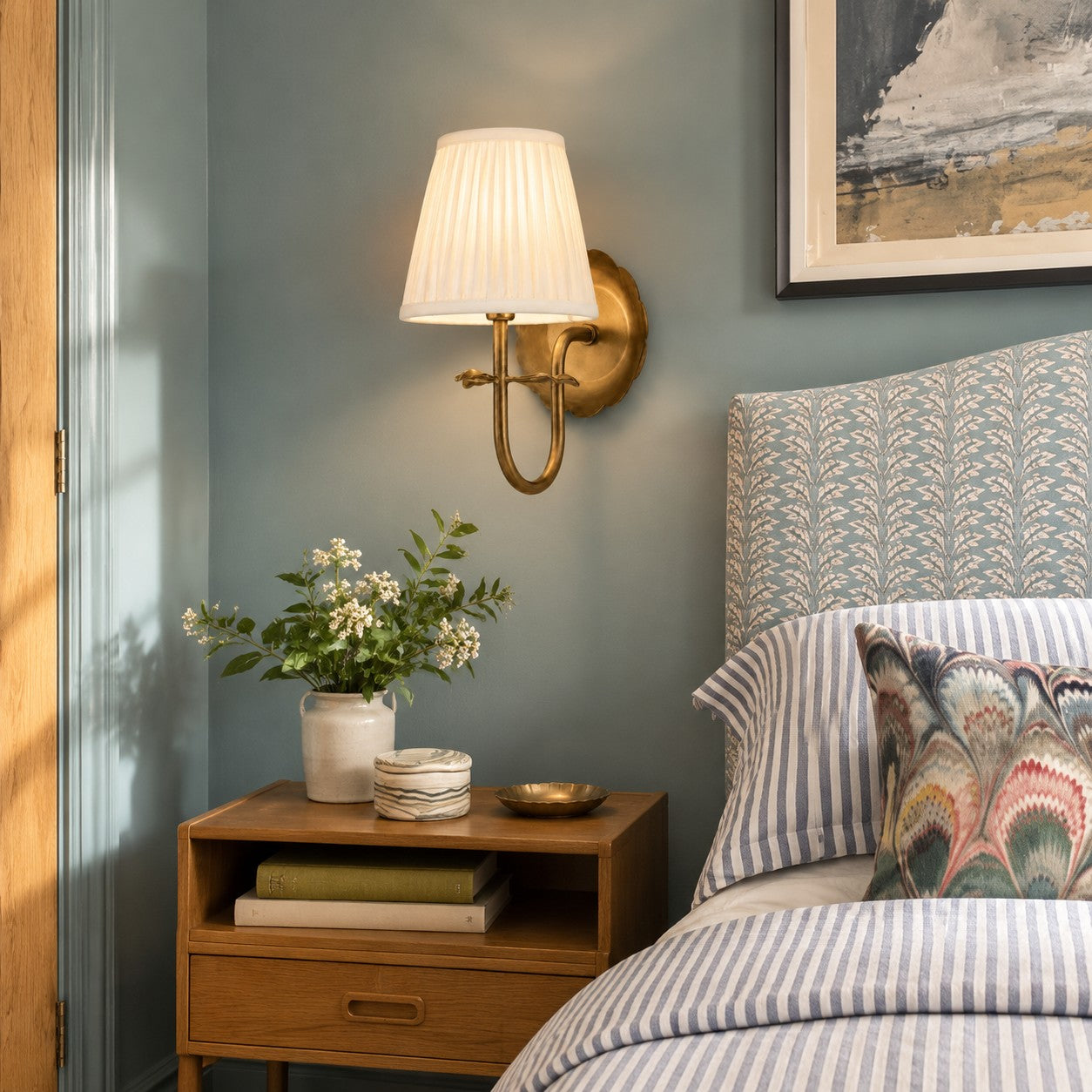 Luvora wall sconce styled in a bedroom