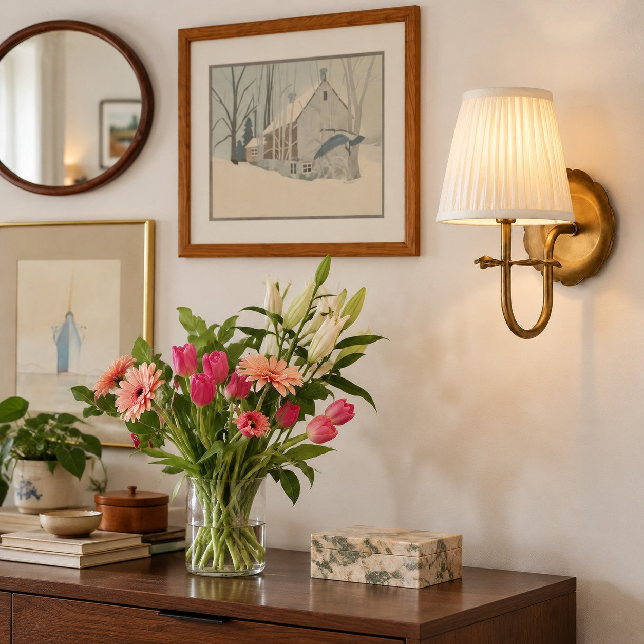Luvora wall sconce styled above a living-room console