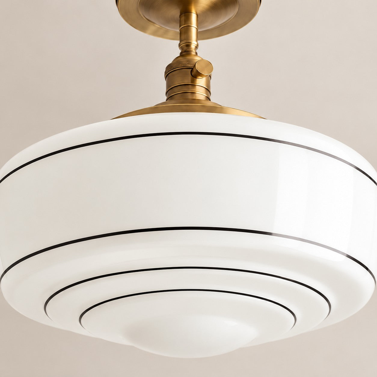 Close-up of the black stripes on the white glass shade