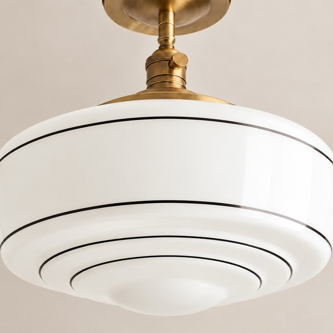Close-up of the black stripes on the white glass shade