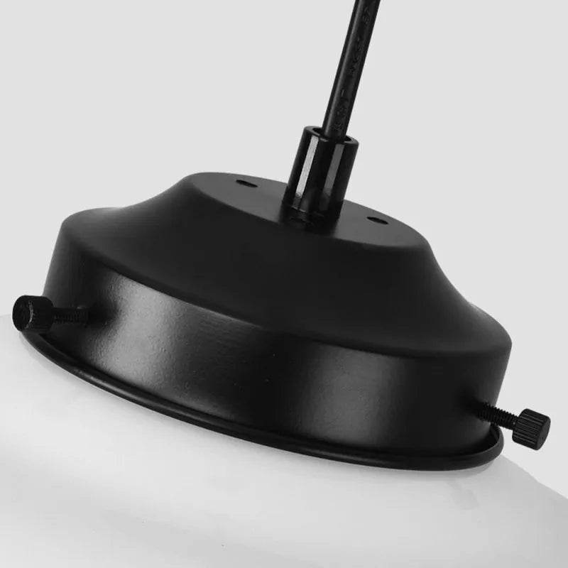 Opelina milk glass pendant, black metal canopy close-up