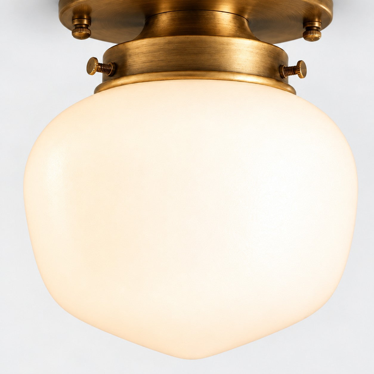 Opelina brass opal glass globe close-up
